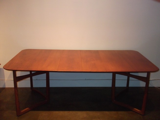 OMG!!! A Spectacular Super Rare SOLID teak dining table designed by Peter Hvidt & Orla Molgaard- Nielsen for France & Daverkosen - this beauty is an early one - comes with 2 leaves giving the table an overall extension of 79.25"L - unique leg structure with gorgeous brass accents - super versatile -SOLD