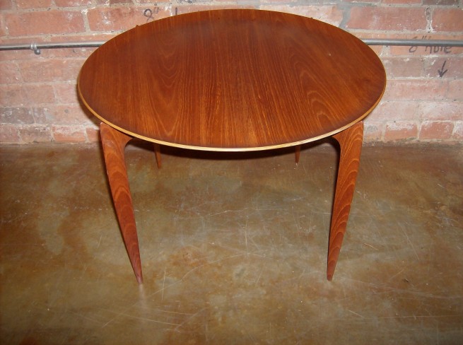 Finely crafted Danish modern tray table designed by Svend Age Willumsen & Hans Engholm - 1958 - by Fritz Hansen - Denmark - removable tray table with - hinged legs that fold flat - stunning design - excellent condition - measures - 23.5"diameter x 16.5"H - $475