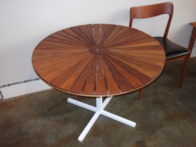 Great teak and metal patio table made in Denmark by BKS,measures 39" round X 26.5" H $680