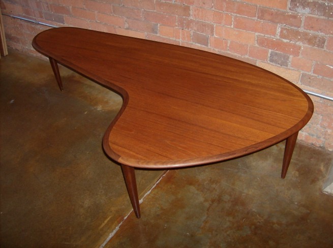 Exceptional 1960′s Danish boomerang teak coffee table – an incredibly rare find – spectacular condition – measures – 64.5″ L X 33″ D X 17″ H $925