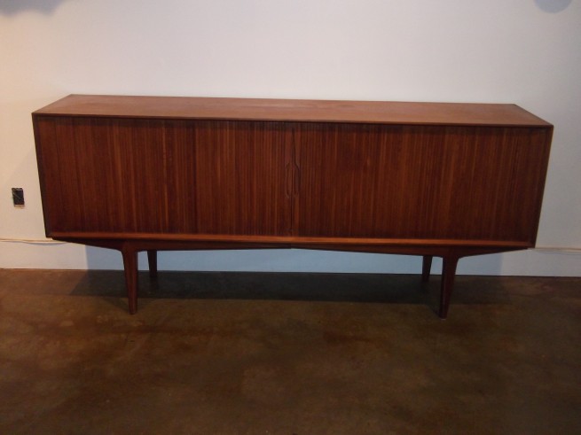 Outstanding Early Danish teak credenza - spectacular design and craftsmanship - this beauty also features tambour doors w/ 3 functional dovetailed drawers in side and a couple adjustable shelves - (SOLD)