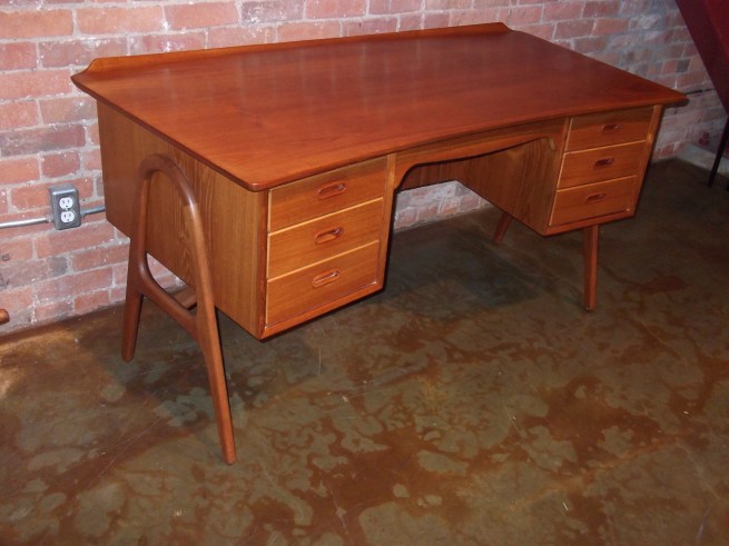 Exceptional Mid-century modern teak desk by Architect Svend Age Madsen - Denmark - lovely curves - quality craftsmanship - open bookcase on the backside or front side (depending on your way of thinking:)) lovingly re-finished top - A RARE FIND- Danish design at it's best - 59'L x 30"D x 28.75"H (SOLD)