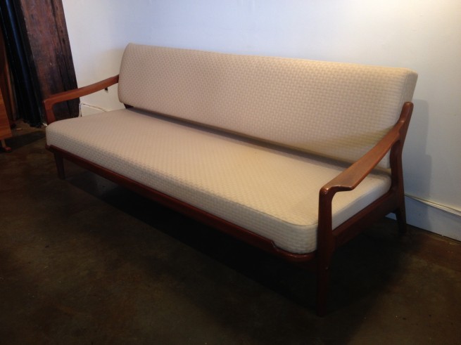 Danish teak sofa designed by Arne Wahl Iversen,extends into a single bed(SOLD)