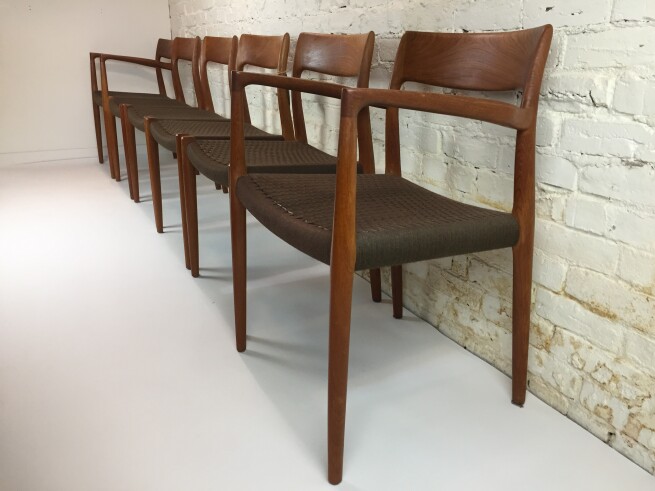 Exceptional set of 1960's teak dining chairs Model #76 designed by Niels Moller for J.L. Moller - Made in Denmark - this set comes with 4 side chairs and 2 arm chairs - very hard to find set with 2 arm chairs - excellent vintage condition - a forever set that you pass down :) - $3400