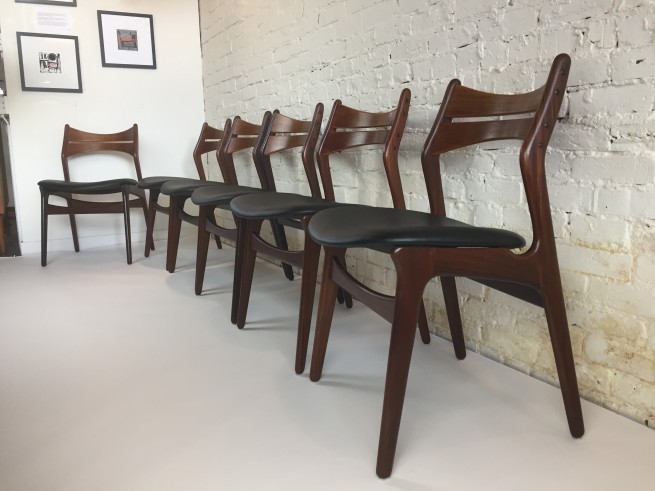 Set of 6 Exceptional completely restored Danish Modern teak dining chairs designed by Erik Buch for Christiansen Mobelfabrik - 1965 model #310 - refinshed wood frames and newly upholstered seats in black naugahyde (SOLD)
