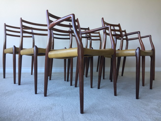 Danish 1960’s Set x 8 Brazilian Rosewood Dining Chairs. Designed by Niels Otto Møller, Produced by J.L. Møllers Møbelfabrik - 2 arm chairs and 6 side chairs - definitely the most sculptural design this company did - absolutely stunning - original leather - some stains on the leather, but overall very good vintage condition -