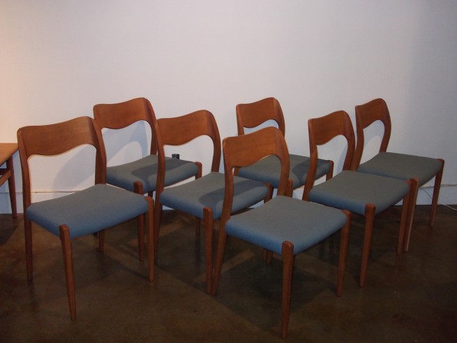Gorgeous set of 7 teak dining chairs designed by Niels Moller for famed Danish company J.L. Moller - company known for their outstanding quality - most coveted of the designs model 71 - newly restored with all new foam and re-upholstered in a fantastic quality fabric by Herman Miller - (light blue) - (SOLD)