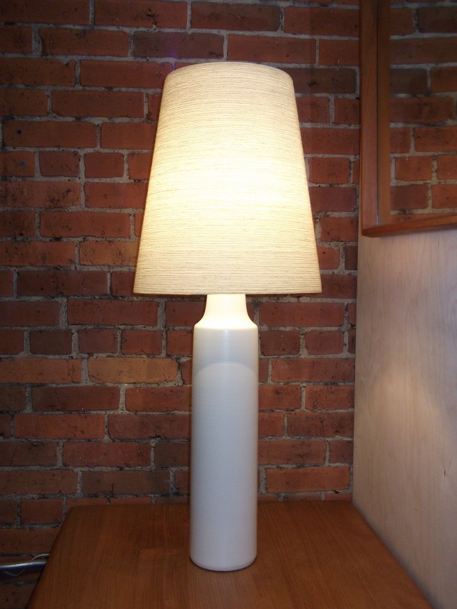 Gorgeous Mid-century ceramic lamp w/ it's original fiberglass shade designed and made by Danish couple Lotte & Gunnar Bostlund - stunning snow white in color this beauty stands a glorious 37" high - (SOLD)