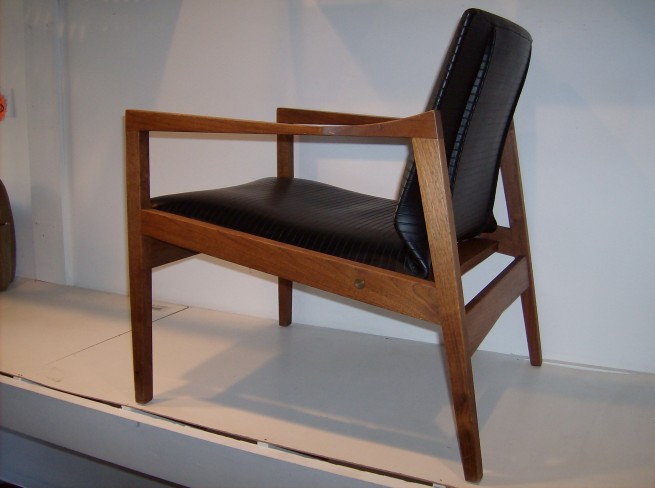 Incredible Canadian designed and manufactured lounge chair by Walter Nugent of Walter Nugent designs - Oakville Ontario - 1950's - this version being the walnut frame with his awarding winning sprung back ribbed vinyl seat - an incredible design - looks great from every angle - fantastic vintage condition - 2 available - $550 each - PLUS THE LOVESEAT TO MATCH - Canadian modernism at it's best!!!!!!