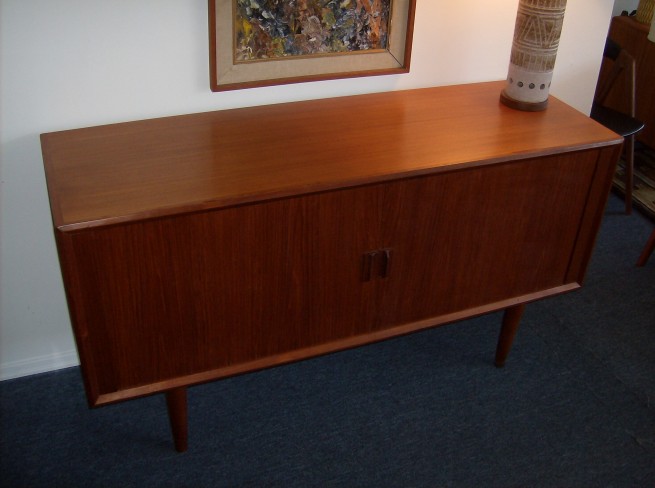 Stunning Mid-century Danish teak credenza  --designed by Sven Aage Larsen for Faarup - Denmark - magnificent tambour doors - 4 gorgeous dovetailed drawers inside, along with 2 shelves - beautiful condition - this beauty measures - 59"L x 19"D x 31.5"H - $750