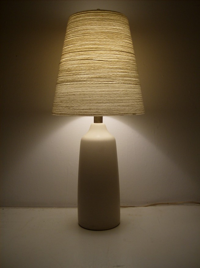Stunning 1960's off white ceramic lamp designed by husband and wife team Lotte and Gunnar Bostlund comes with the original fiberglass&impregnated yarn shade - classic Mid-century modern -this beauty stands 20.5"tall including the shade - - (SOLD)