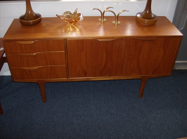 Spectacular Mid-century modern teak credenza by A.H McIntosh&Co. - Kirkcaldy Scotland - incredibly well made - dovetailed drawers - gorgeous handles - very good condition - this beauty measures - 60.5"L x 17"D x 29.5"H - $895