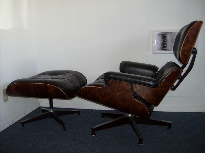 The iconic original Eames lounger with ottoman for Herman Miller - gorgeous supple black leather - incredible grain pattern - not sure of date - excellent condition - paper labels attached on both the ottoman and chair, along with the Herman Miller logo - (SOLD)