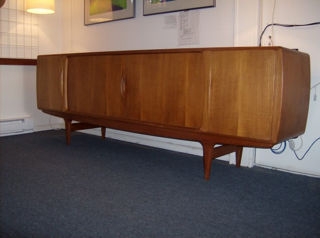 One of the best Mid-century Danish teak sideboards we have ever seen - designed by Johannes Andersen - this beauty features tambour doors -inside smaller drawers and shelves - stellar craftsmanship - this beast measures L 95" X D 20" X H 33" (SOLD)